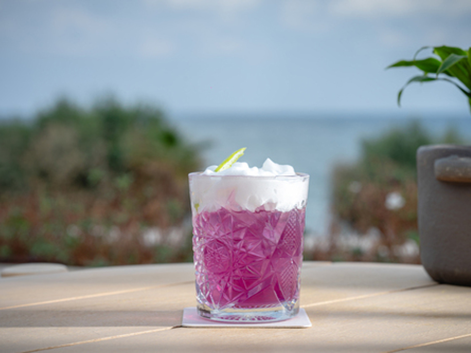 Sip the Magic of Creta Maris: Create Your Own Purple Angel Cocktail! 